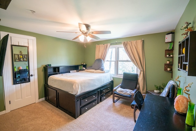 bedroom featuring ceiling fan and carpet flooring