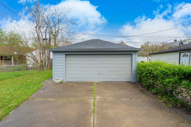 detached garage with fence