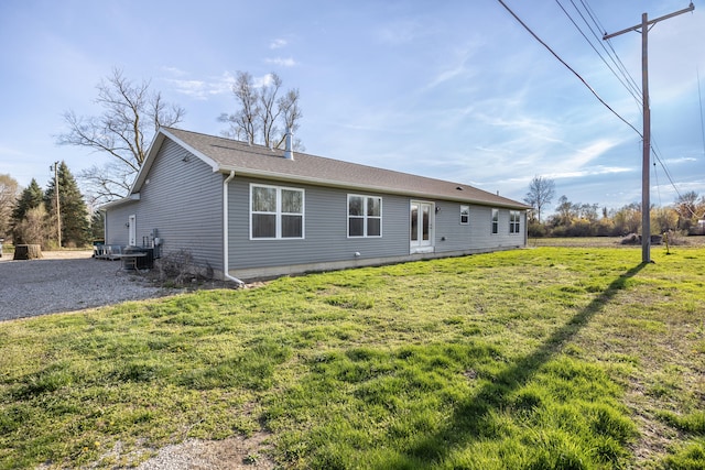 48320 Martz Rd, Michigan, MI 48111 - back of property featuring a lawn and a shingled roof