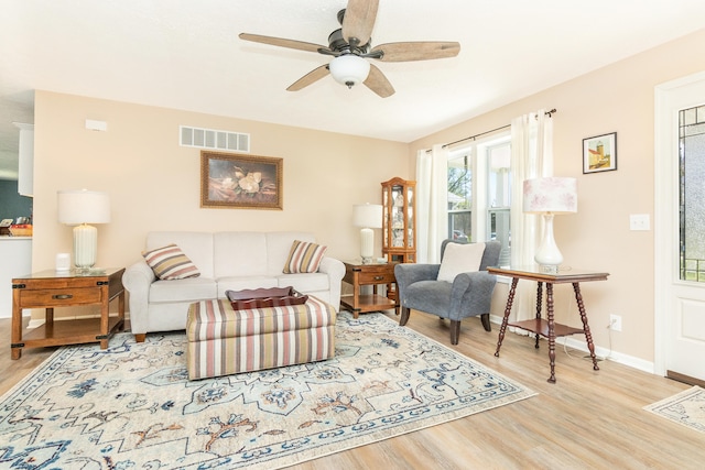 48320 Martz Rd, Michigan, MI 48111 - living room with baseboards, a ceiling fan, visible vents, and light wood-style flooring