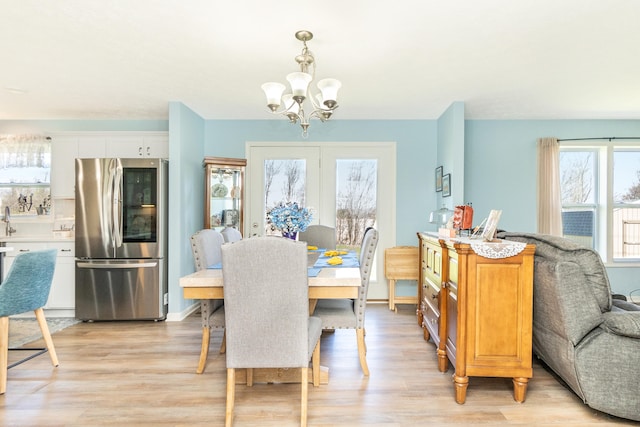 48320 Martz Rd, Michigan, MI 48111 - dining space featuring an inviting chandelier and light wood-style floors