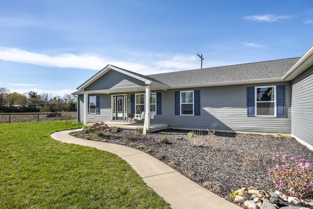 48320 Martz Rd, Michigan, MI 48111 - view of front of house with a front lawn, fence, and covered porch