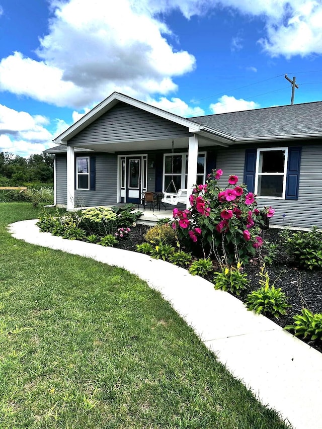 48320 Martz Rd, Michigan, MI 48111 - ranch-style home with a front lawn and covered porch