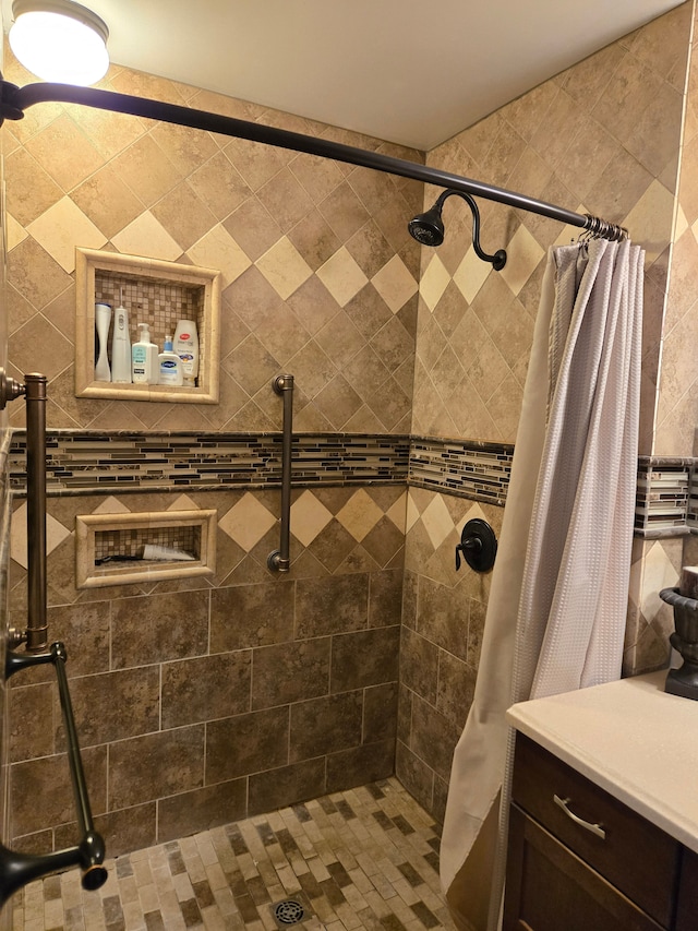 bathroom with a stall shower