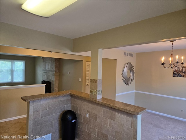 450 Billingsgate Unit C, Bloomfield Hills, MI 48301 - bar area with a high end fireplace and a chandelier