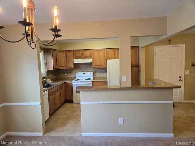 450 Billingsgate Unit C, Bloomfield Hills, MI 48301 - kitchen featuring white appliances, under cabinet range hood, light tile patterned floors, and brown cabinetry