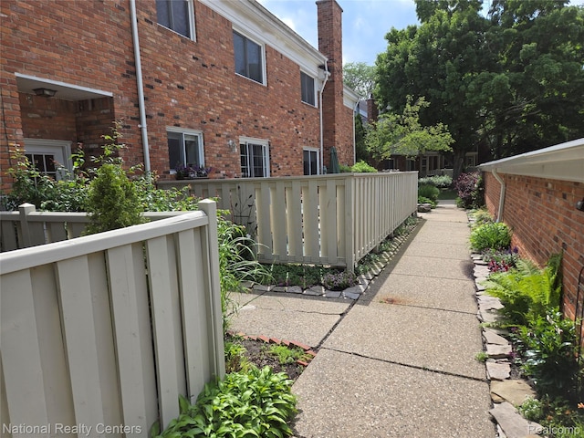 450 Billingsgate Unit C, Bloomfield Hills, MI 48301 - view of property exterior with brick siding