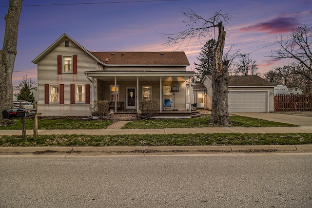 view of front of home with concrete driveway, an attached garage, fence, a porch, and roof with shingles