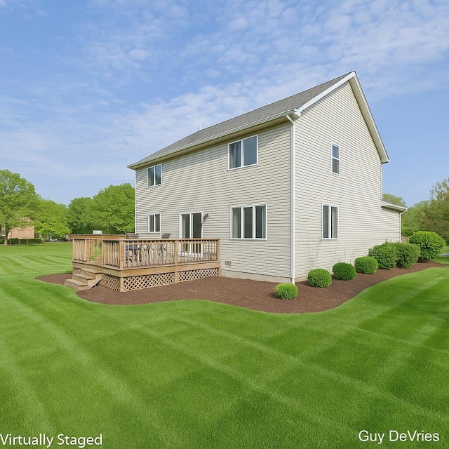 2658 Golfridge Dr SE, Grand Rapids, MI 49546 - rear view of house with a lawn and a wooden deck