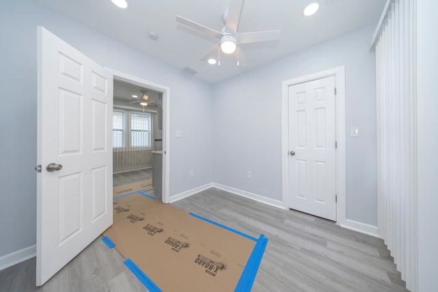 unfurnished bedroom featuring recessed lighting, visible vents, wood finished floors, and baseboards