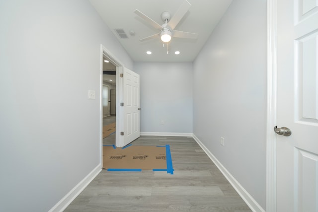 unfurnished bedroom featuring visible vents, baseboards, recessed lighting, wood finished floors, and a ceiling fan