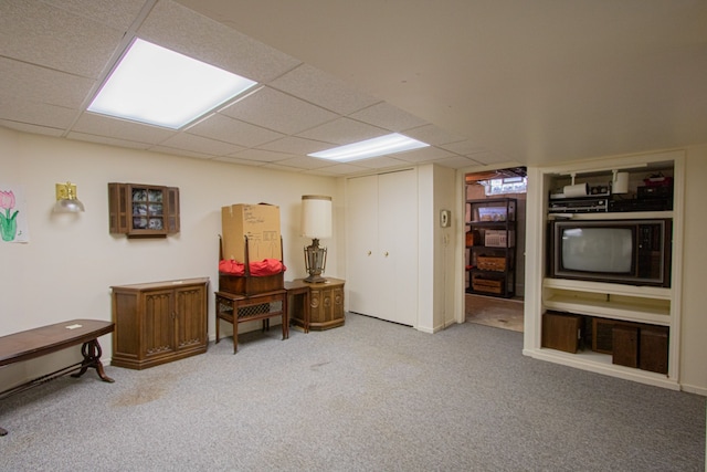 home office featuring carpet floors and a drop ceiling