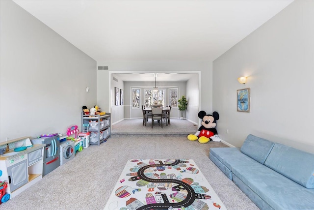 playroom featuring baseboards, visible vents, and carpet floors