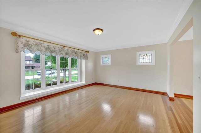 2485 Kimberly Fair St, Rochester Hills, MI 48309 - empty room with baseboards, crown molding, and light wood-style floors