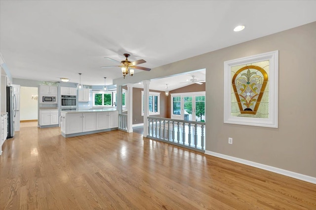 2485 Kimberly Fair St, Rochester Hills, MI 48309 - unfurnished living room with ceiling fan, baseboards, light wood-style floors, and recessed lighting