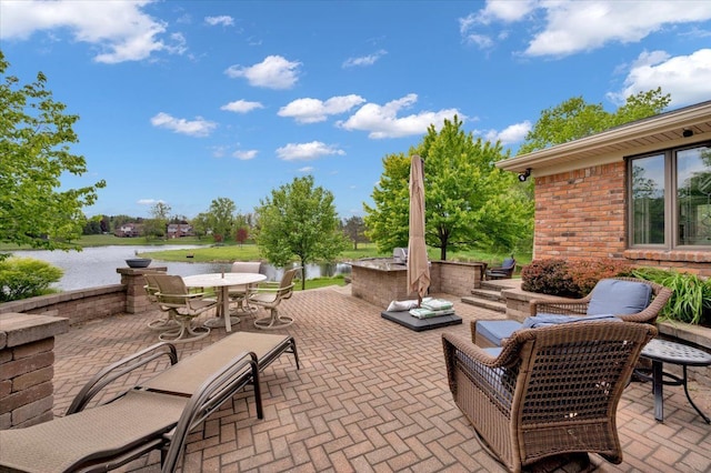 2485 Kimberly Fair St, Rochester Hills, MI 48309 - view of patio / terrace featuring outdoor dining area and a water view