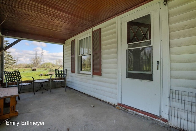 view of patio featuring a porch