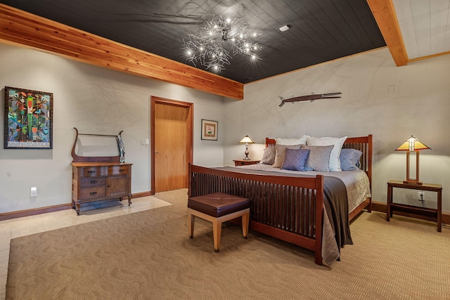 5788 M 63, Coloma, MI 49038 - bedroom with light carpet, an inviting chandelier, beam ceiling, and baseboards