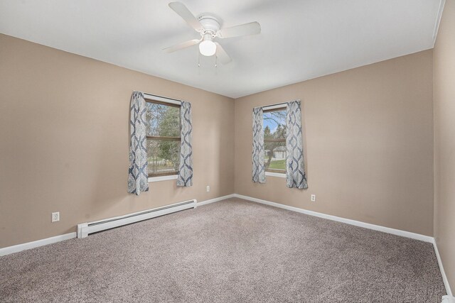 empty room featuring a ceiling fan, baseboards, carpet floors, and a baseboard radiator