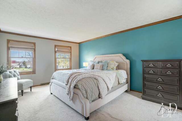 bedroom with carpet, visible vents, crown molding, and baseboards