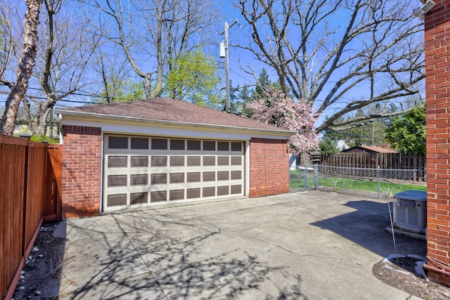 20 Oxford Blvd, Pleasant Ridge, MI 48069 - detached garage featuring fence and cooling unit
