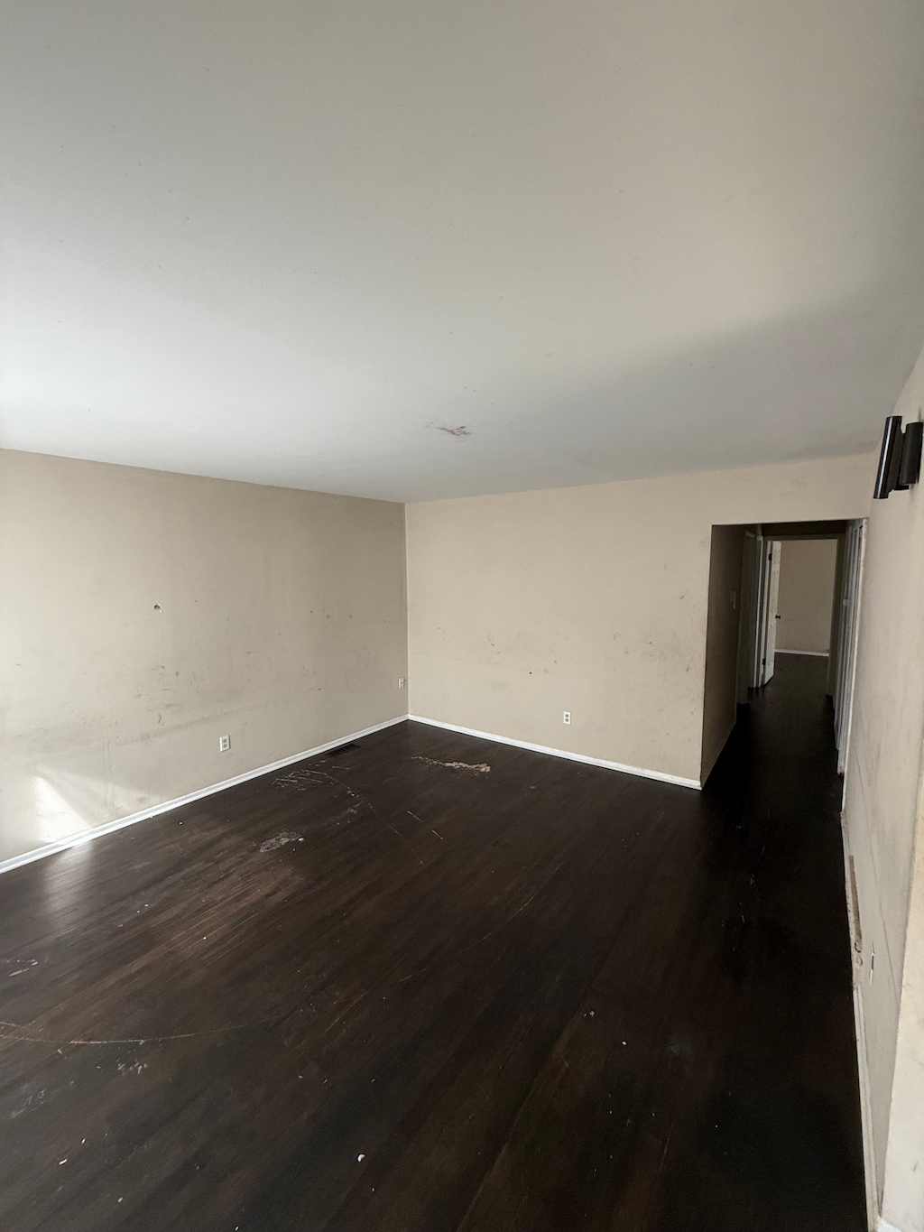 4123 Burton St, Inkster, MI 48141 - spare room with dark wood-style floors and baseboards