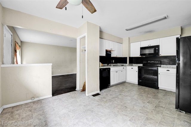 4123 Burton St, Inkster, MI 48141 - kitchen with black appliances, ceiling fan, white cabinetry, tasteful backsplash, and light stone counters