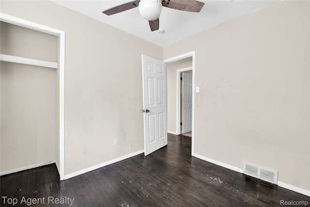 4123 Burton St, Inkster, MI 48141 - unfurnished bedroom with wood finished floors, baseboards, and ceiling fan