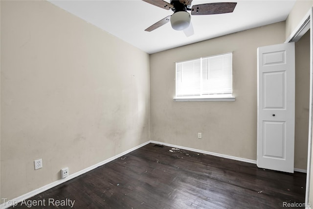 4123 Burton St, Inkster, MI 48141 - unfurnished bedroom with wood finished floors, baseboards, and ceiling fan