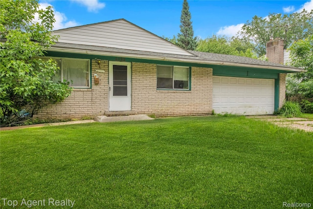 4123 Burton St, Inkster, MI 48141 - view of front facade with a chimney, brick siding, a front yard, and a garage