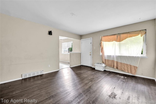 4123 Burton St, Inkster, MI 48141 - unfurnished room featuring wood finished floors and baseboards