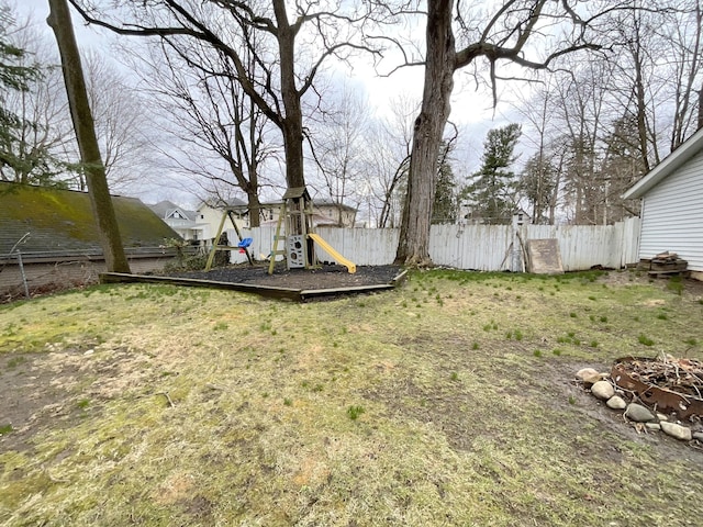 323 N Marshall Ave, Marshall, MI 49068 - view of yard with fence and a playground