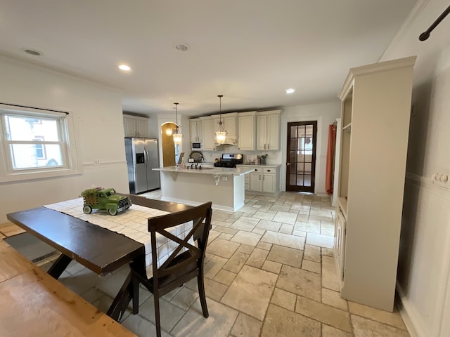 323 N Marshall Ave, Marshall, MI 49068 - dining area with recessed lighting and stone tile floors