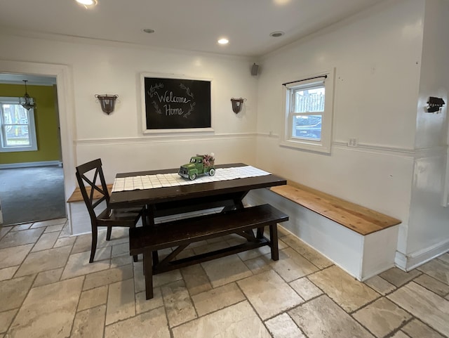 323 N Marshall Ave, Marshall, MI 49068 - dining space with recessed lighting, stone tile floors, crown molding, and a healthy amount of sunlight
