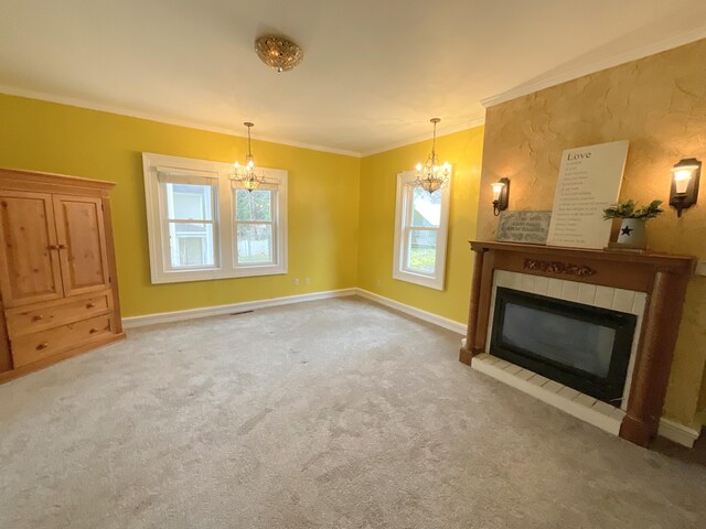 323 N Marshall Ave, Marshall, MI 49068 - unfurnished living room with crown molding, carpet floors, a notable chandelier, and a tile fireplace
