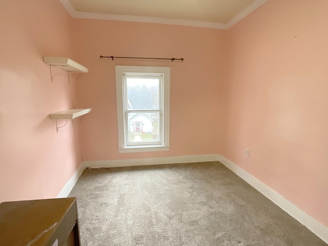 323 N Marshall Ave, Marshall, MI 49068 - carpeted empty room with baseboards and crown molding