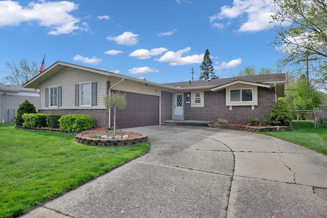 2946 Athena Dr, Troy, MI 48083 - single story home featuring brick siding, an attached garage, a front yard, and concrete driveway