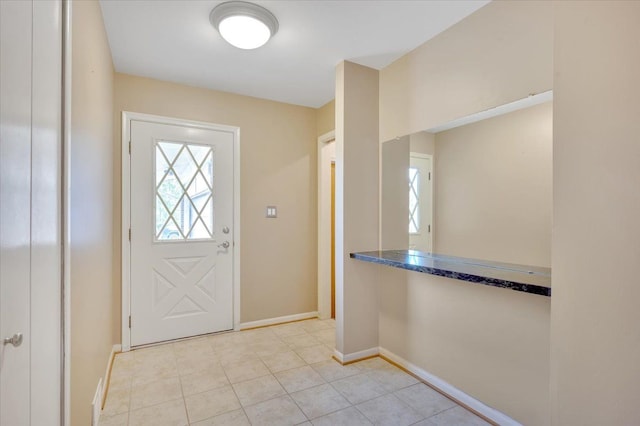 2946 Athena Dr, Troy, MI 48083 - foyer entrance featuring baseboards and light tile patterned floors