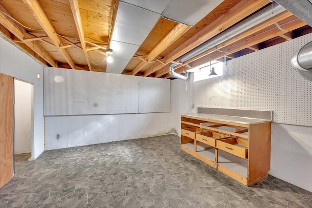 2946 Athena Dr, Troy, MI 48083 - below grade area with stone flooring