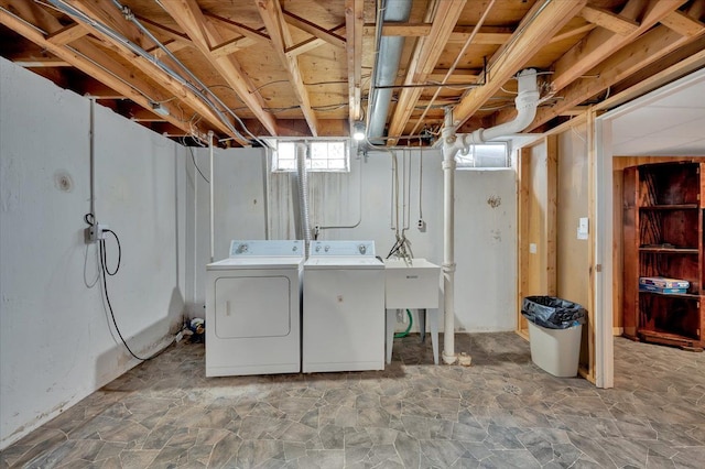 2946 Athena Dr, Troy, MI 48083 - laundry room with a sink, laundry area, and washer and dryer