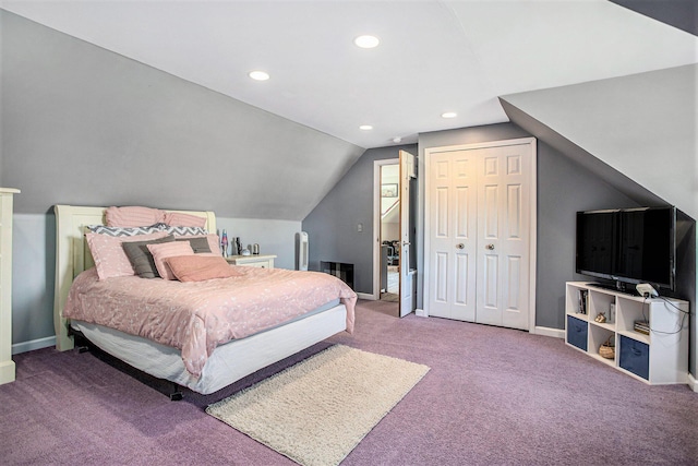 bedroom featuring recessed lighting, lofted ceiling, a closet, baseboards, and carpet flooring