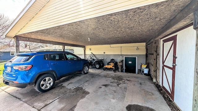 garage with a carport