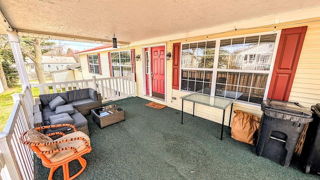 view of patio / terrace featuring covered porch and an outdoor living space