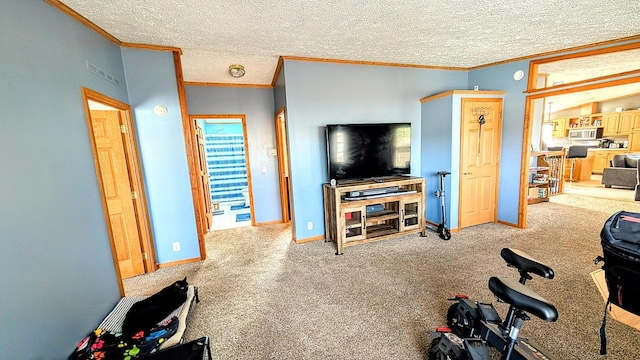 carpeted living area with baseboards, a textured ceiling, and ornamental molding