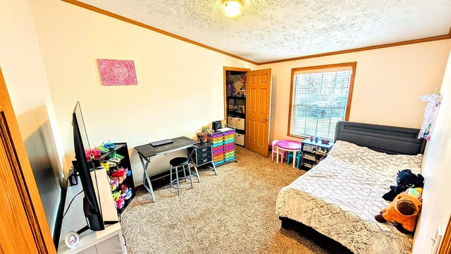 bedroom featuring light colored carpet, a textured ceiling, and ornamental molding