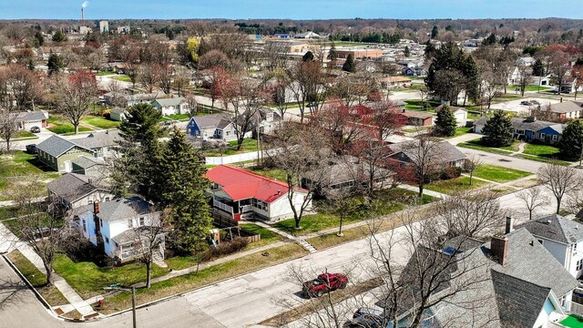 birds eye view of property with a residential view