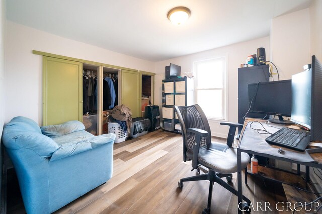 office area with light wood-style flooring