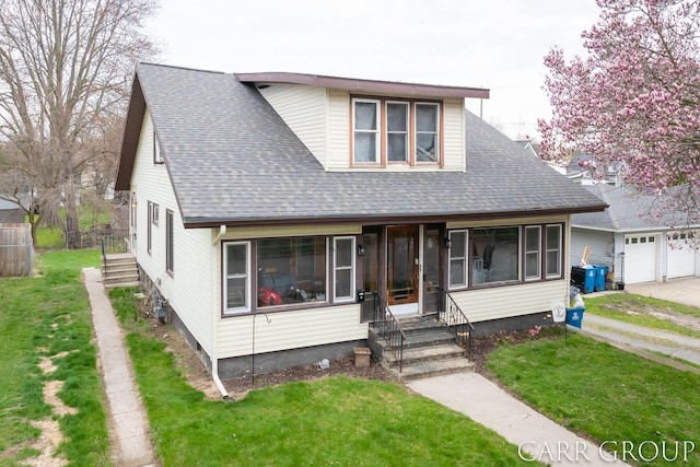 bungalow-style house featuring a shingled roof, a front lawn, and a garage