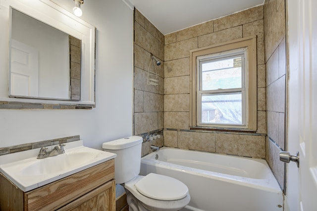 full bath featuring vanity and toilet