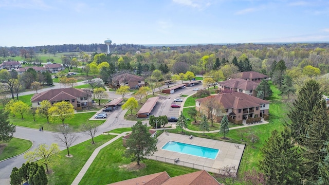 bird's eye view with a forest view and a residential view